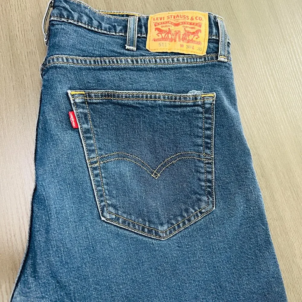 Levi's 511 Jeans Men's Size 38x30 Blue Altered Cut Raw Hem Measures 38x26